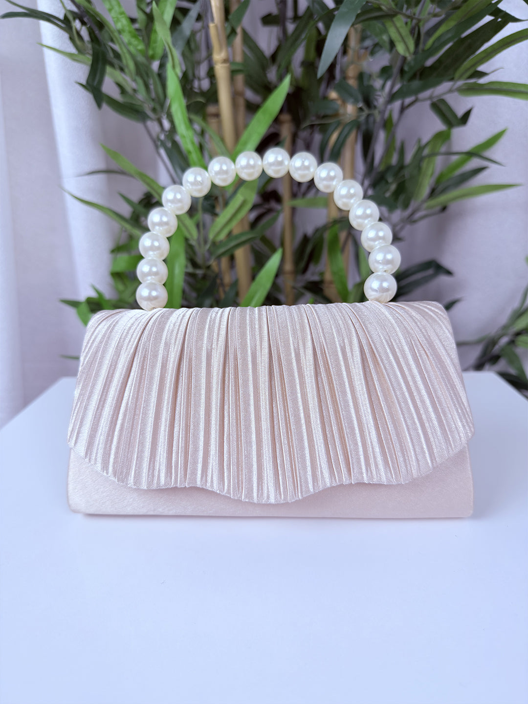 Pochette crème avec perles