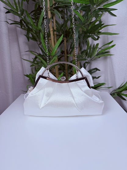 Pochette papillon avec poignée et une bandoulière